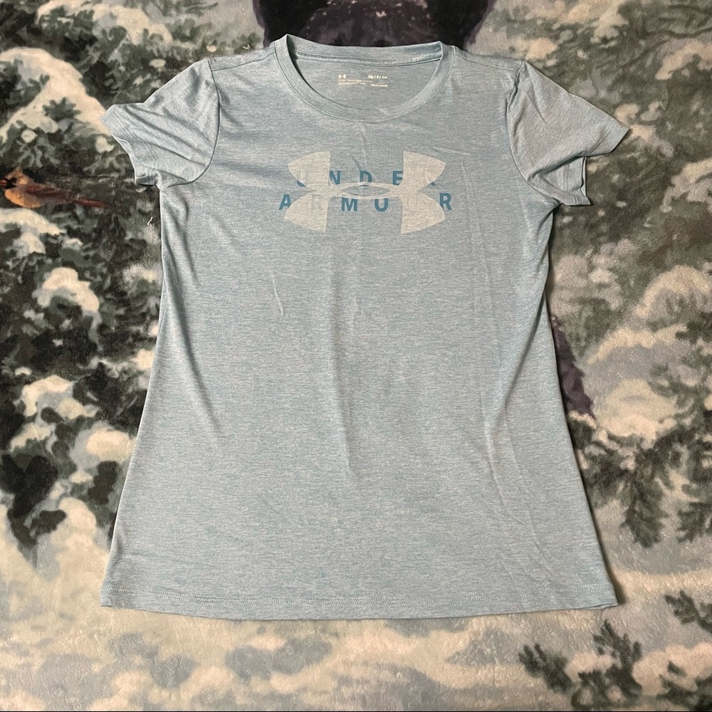 light blue Under Armour shirt